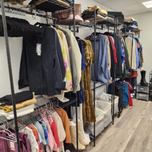 Clothing racks in the DressWell Boutique